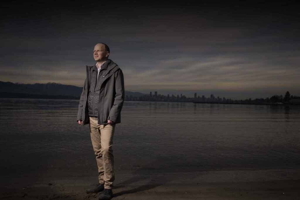 man standing on beach